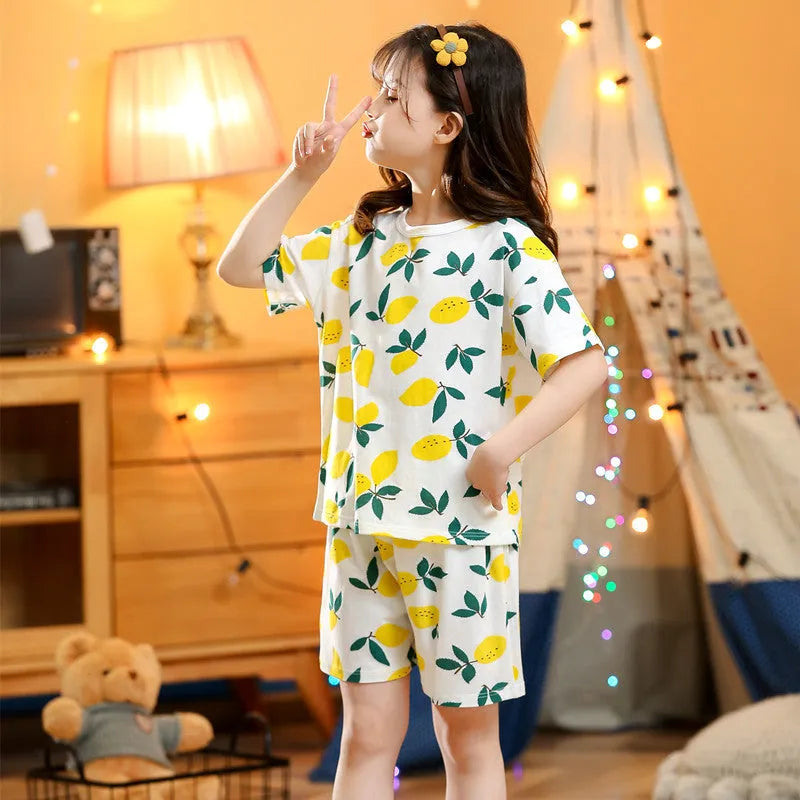 Children's cotton short-sleeved homewear set with cartoon print, top and pants, on a white background