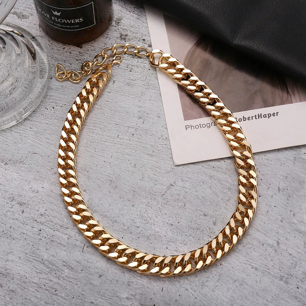 Gold-coloured thick chain necklace for women, measuring 32cm in length.