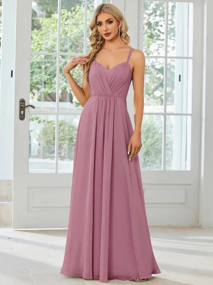Women's long sleeveless A-line dress with pleated skirt in solid colour options