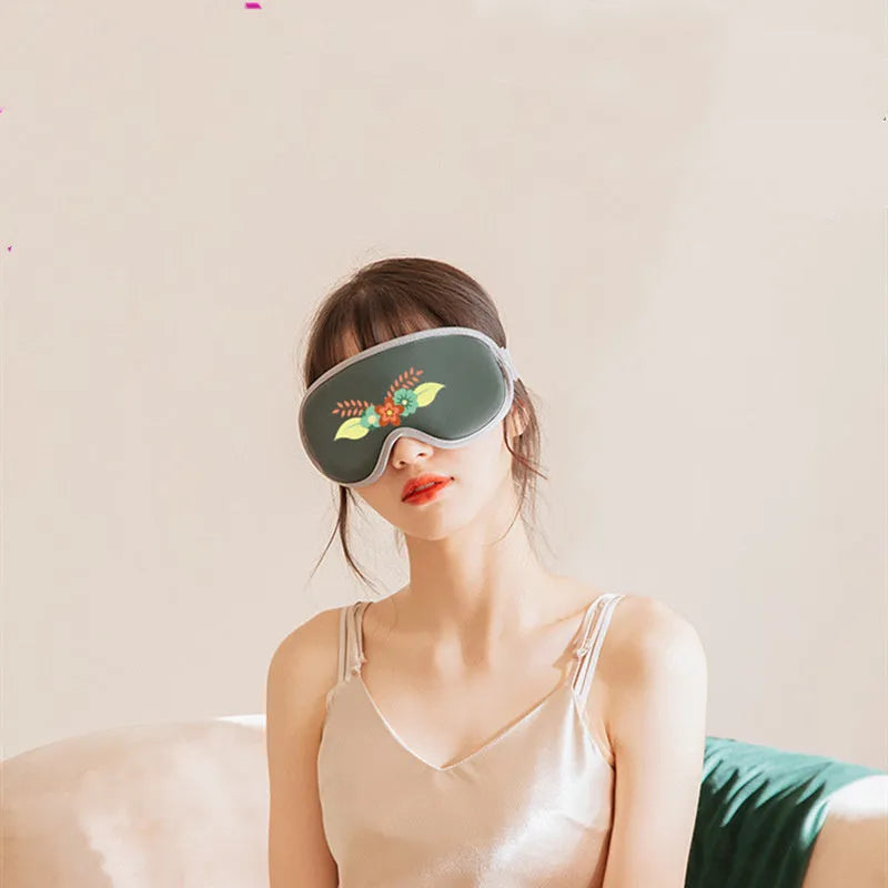 Green portable eye spa massage goggles showing suede shell and soft super fibre interior.