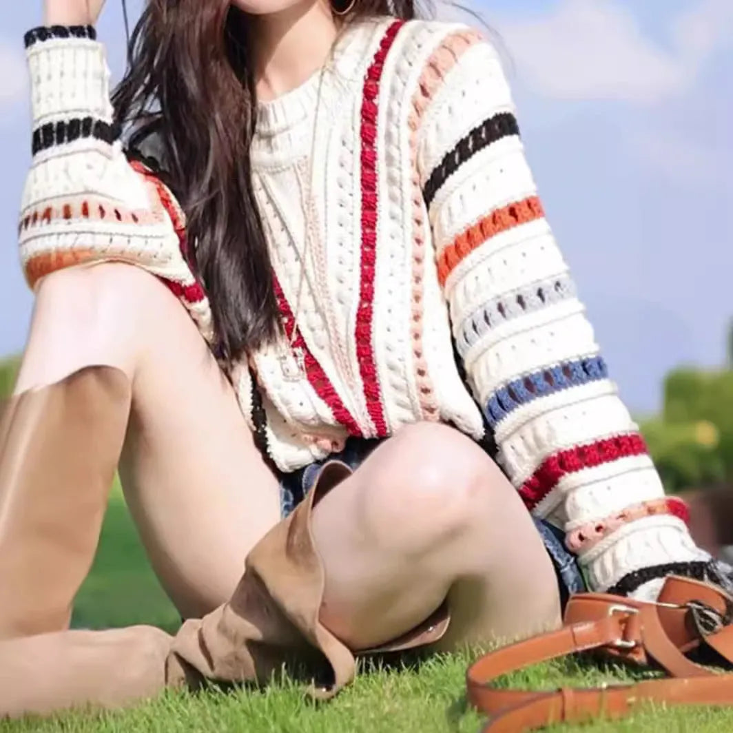 Rainbow striped batwing sleeve pullover sweater with round neck and loose fit