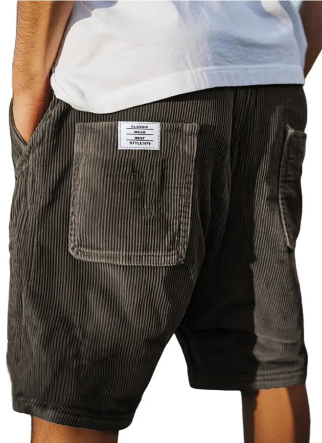 Men's gray corduroy shorts with multiple pockets and embroidery detail on straight-leg summer design