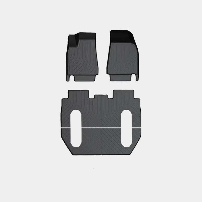 Tesla Model X waterproof TPE rubber floor mats showing left and right rudder design for vehicle-specific fitment