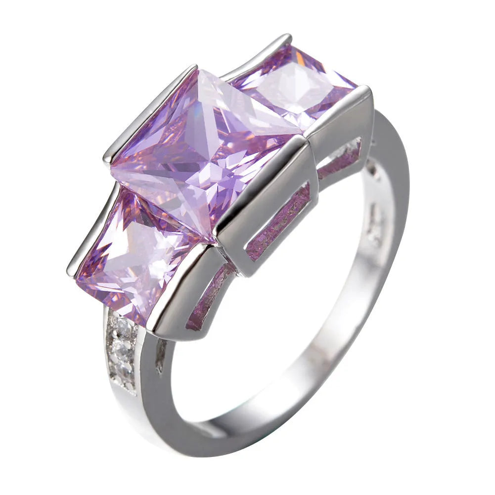 Geometric copper women's ring in champagne colour on a size no.8 finger, showing metal band and electroplated finish.