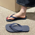 Men's PVC flip flops with toe covering design in multiple colour options showing injection moulded sole