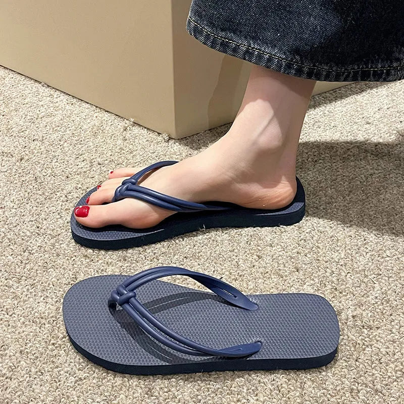 Men's PVC flip flops with toe covering design in multiple colour options showing injection moulded sole