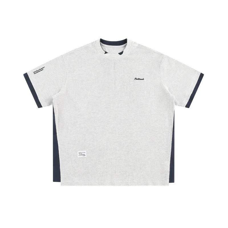 Retro alphabet embroidered loose waffle t-shirt in navy blue, short sleeve pullover style.