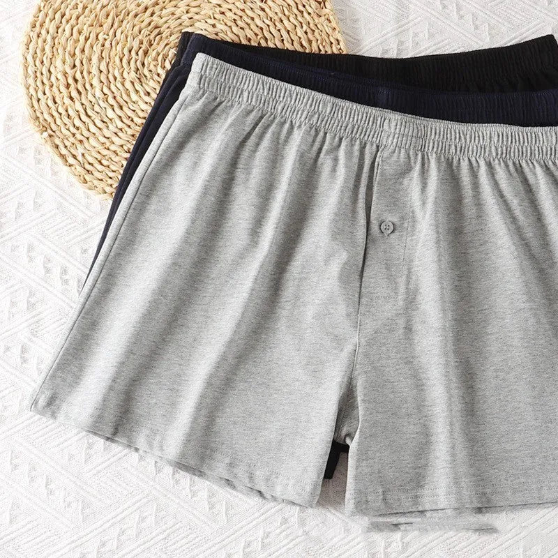 Men's light grey pure cotton loose fit boxer shorts with a high waist.