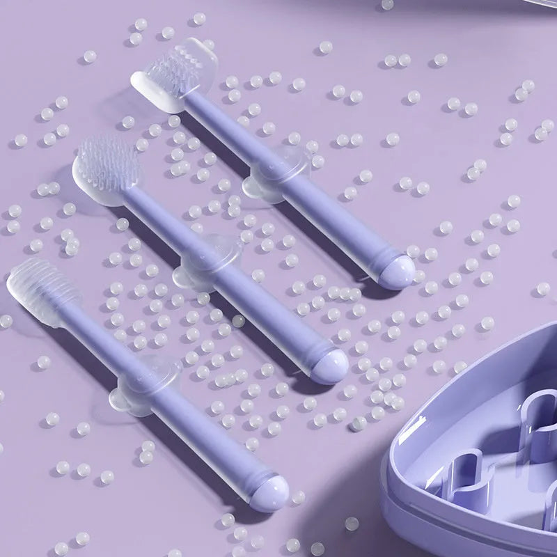 Soft silicone pet toothbrush for dogs and cats in purple, blue, and green colour options.