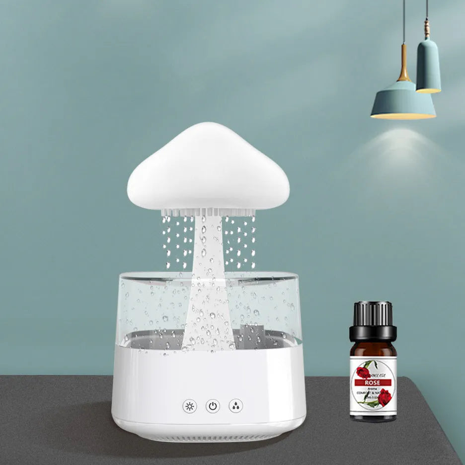2-in-1 desk humidifier with raining cloud design, essential oil diffuser, and night light in white plastic finish