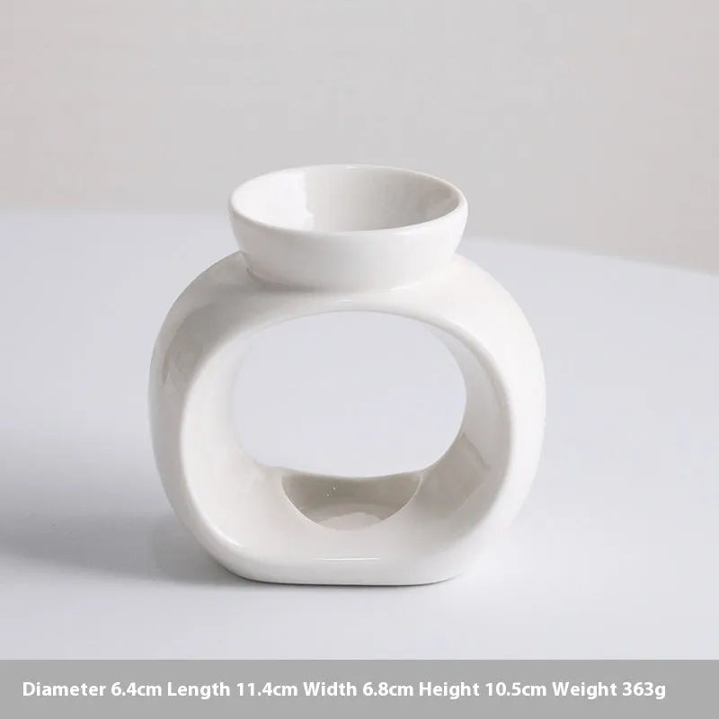 White ceramic Nordic style aromatherapy stove ornament with anti-dry burning design.