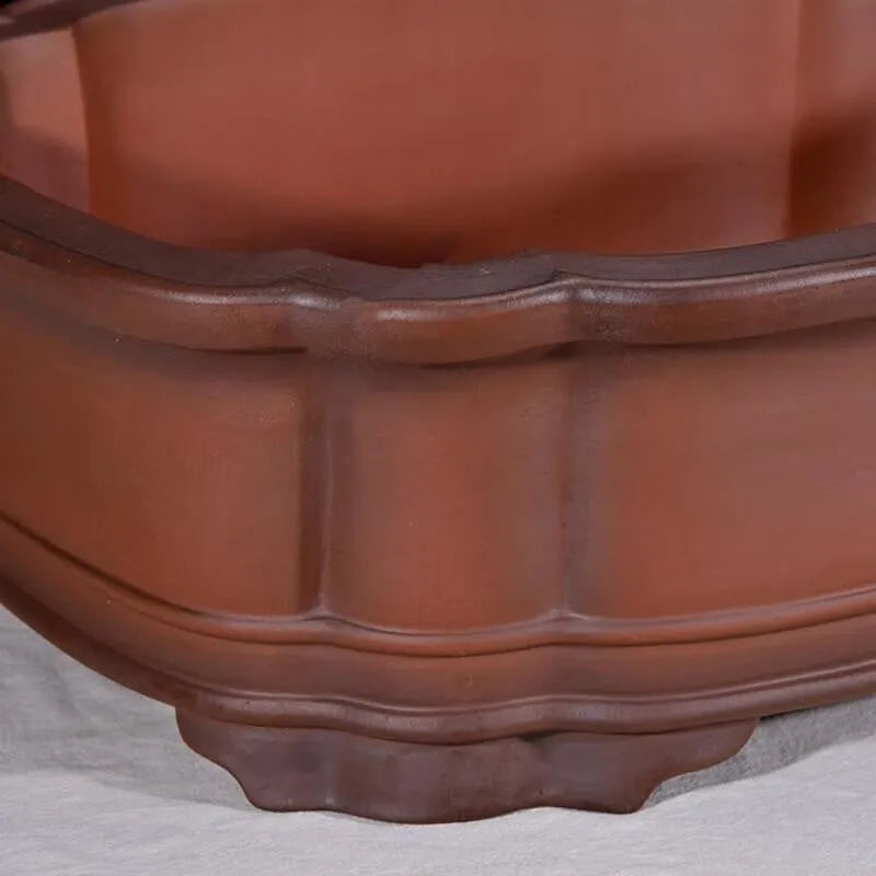 Large antique-style purple clay flowerpot with Chinese design for garden planting