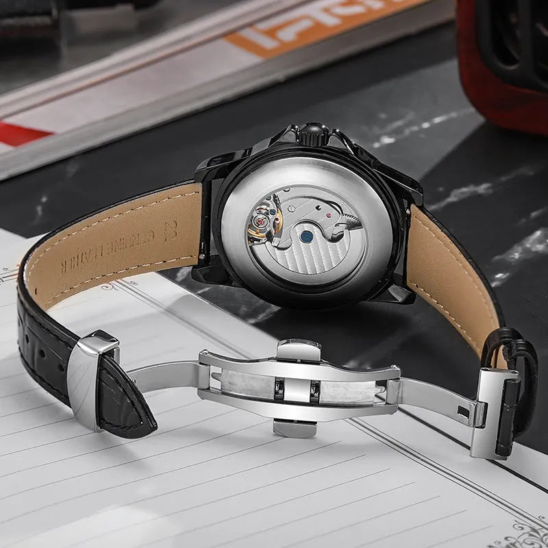 Men's waterproof automatic watch with luminous markers on a steel bracelet and a black dial.