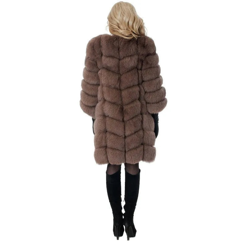Women's long artificial fur coat in wine red colour on a hanger
