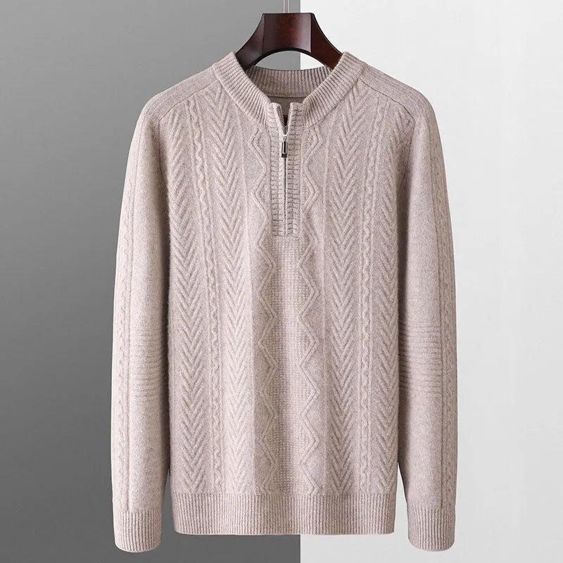 Men's grey wool half zip sweater with a diamond lattice pattern, shown on a model.