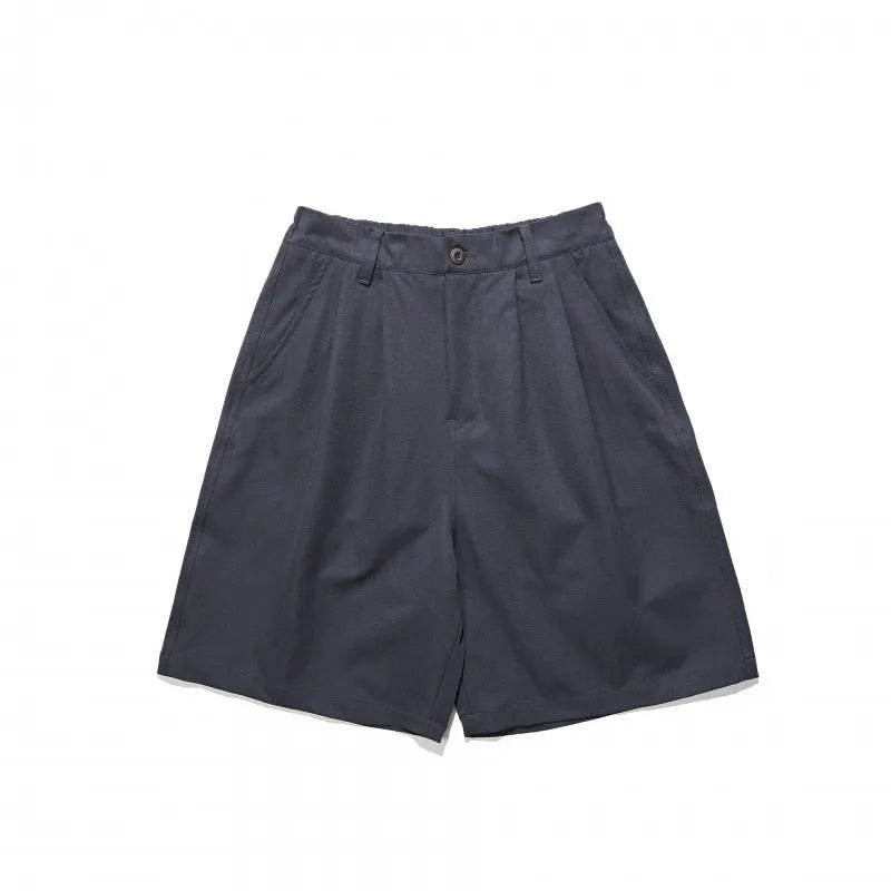 Loose straight drooping suit shorts in light grey, front view, with micro-elastic waist and retro style