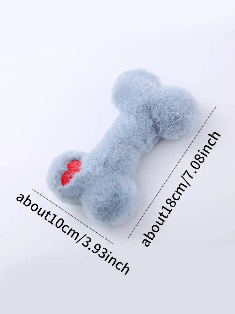 Blue Love Bone shaped plush dog toy with a squeaker on a white background.