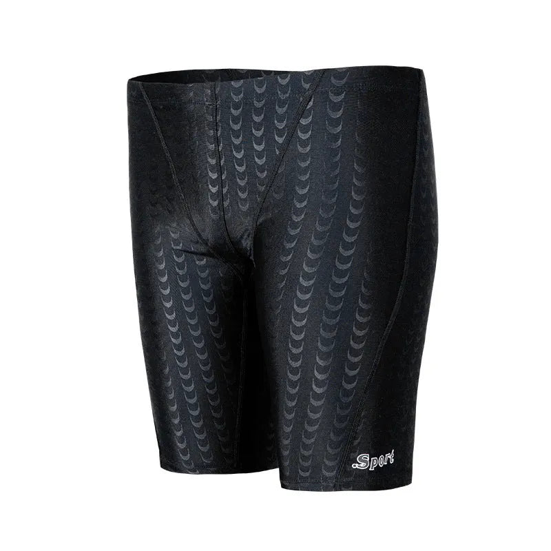 Men's solid colour waterproof shark skin fabric swimming trunks in pool setting