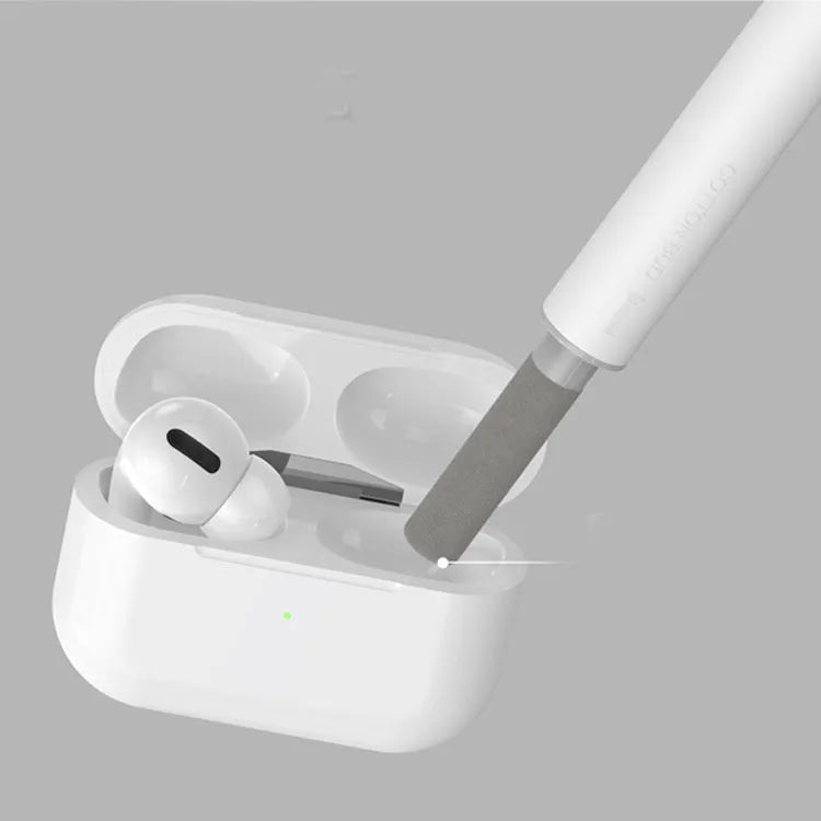 White 3-in-1 headset cleaning pen with ABS, metal, and sponge tips on blue background