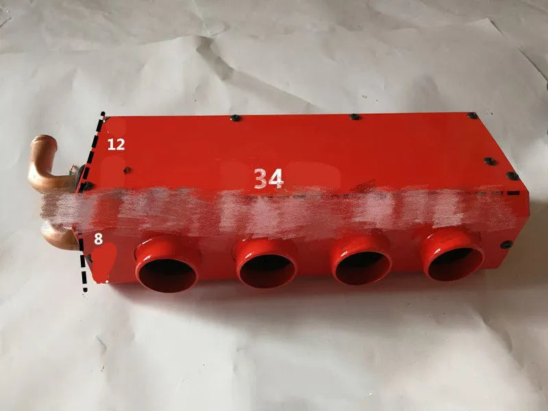 Compact metal car auxiliary heater with copper pipe connections for 12V and 24V vehicle systems.