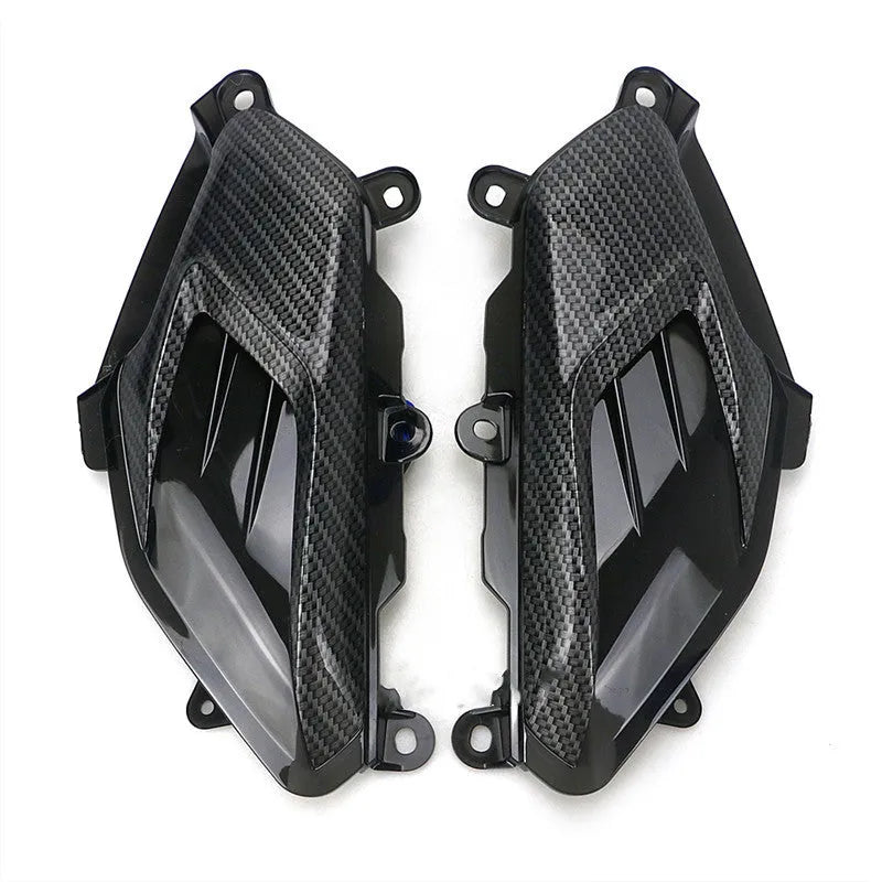 Pair of YAMAHA NMAX carbon fibre LED side lamps with blue or red light options.