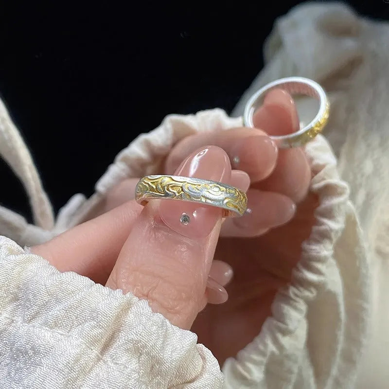Geometric open mouth ring with Xiangyun pattern in electroplated silver and gold finish on white copper