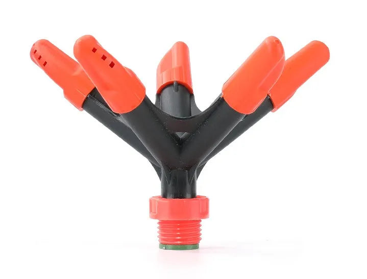Automatic rotating garden sprinkler in orange plastic, size 14x26.5cm, on green lawn
