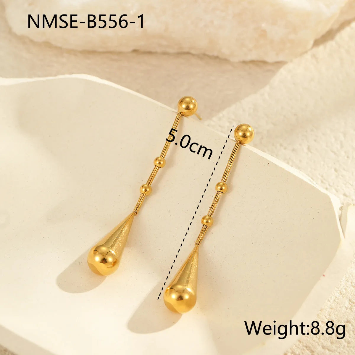Stainless steel tassel water drop earrings with Y-word chain ornament in 18K gold electroplated finish, geometric drop-shaped design
