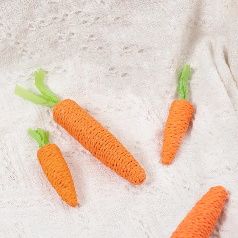 Interactive cat toys set with carrot-shaped paper toys, ringing stones, cat sticks, and dental grinding sticks