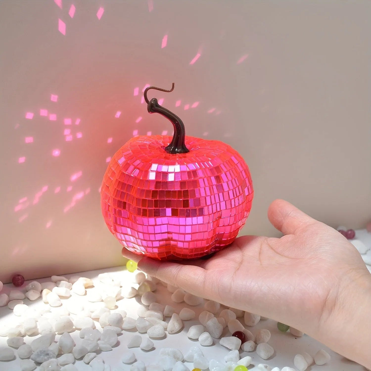 A Chinese-style glass pumpkin ornament with a mirror finish, shown in one of five available sizes.