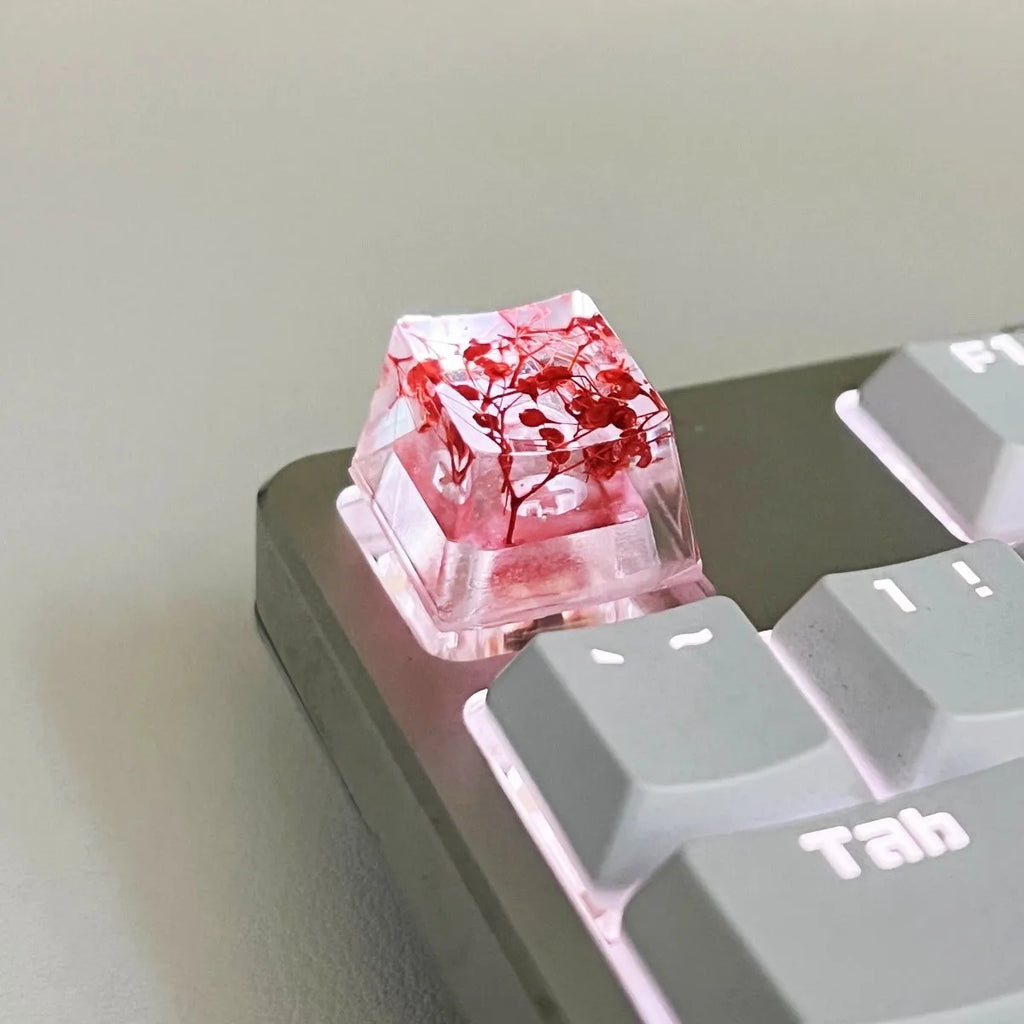High transparency resin keycap with starry sky design for mechanical keyboards in four colours.