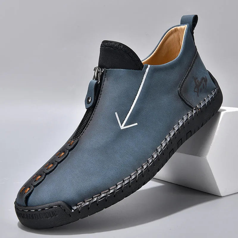 Men's black leather-look casual boot with front zipper, round toe, and mid-calf shaft.