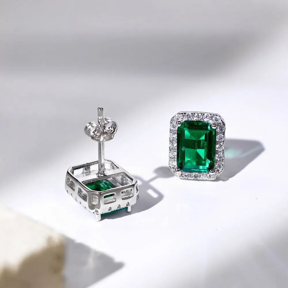 Diamond and emerald symmetry stud earrings in platinum 925 silver 8.5 x 10.5mm