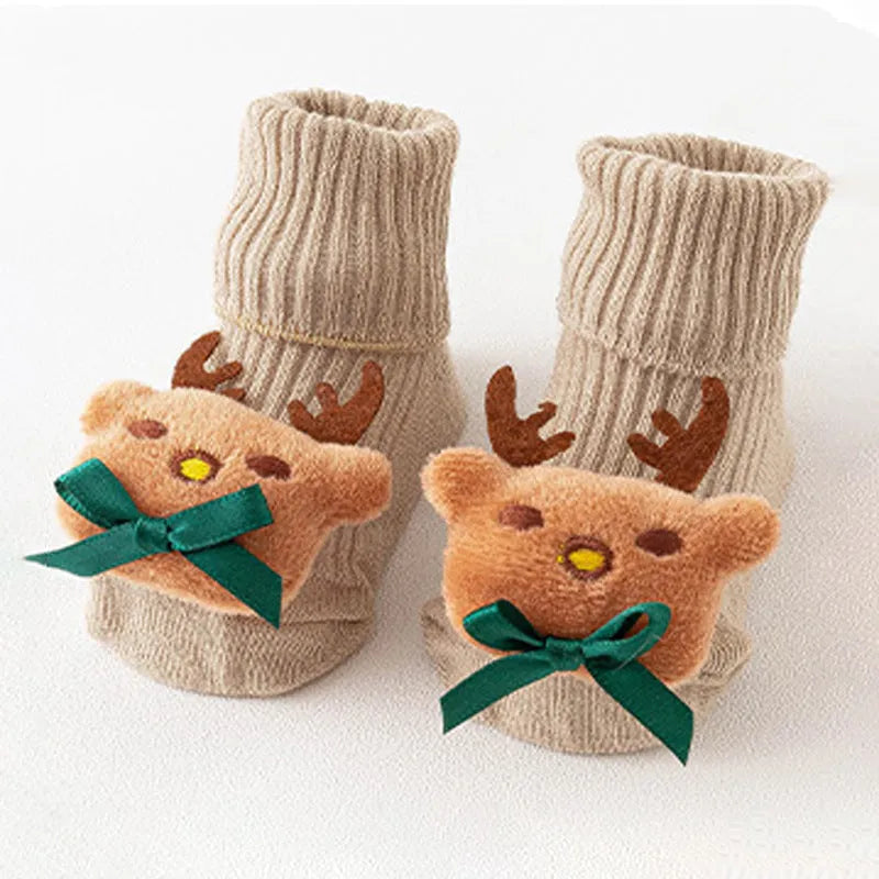 Cotton baby floor socks in various colours and patterns with size guide for ages 0-3 months