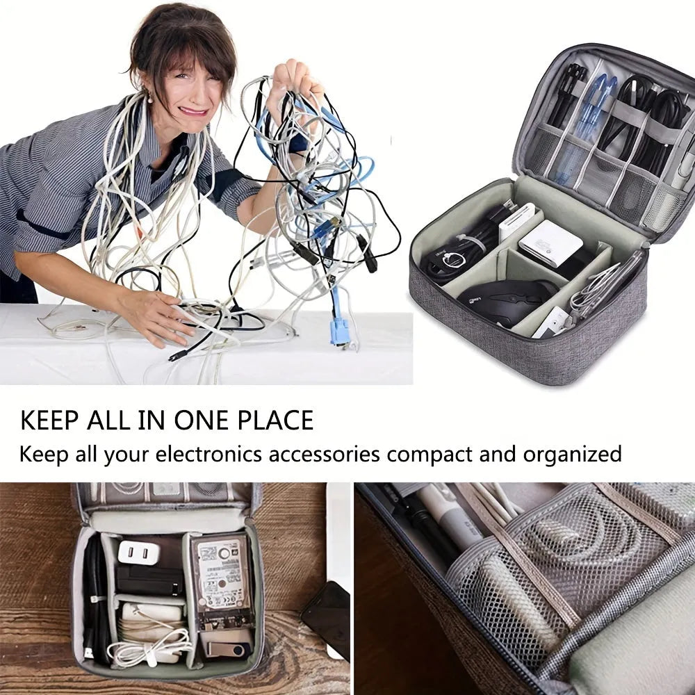 Black waterproof travel cable organiser bag open, showing mesh pockets, elastic loops, and removable padded dividers.