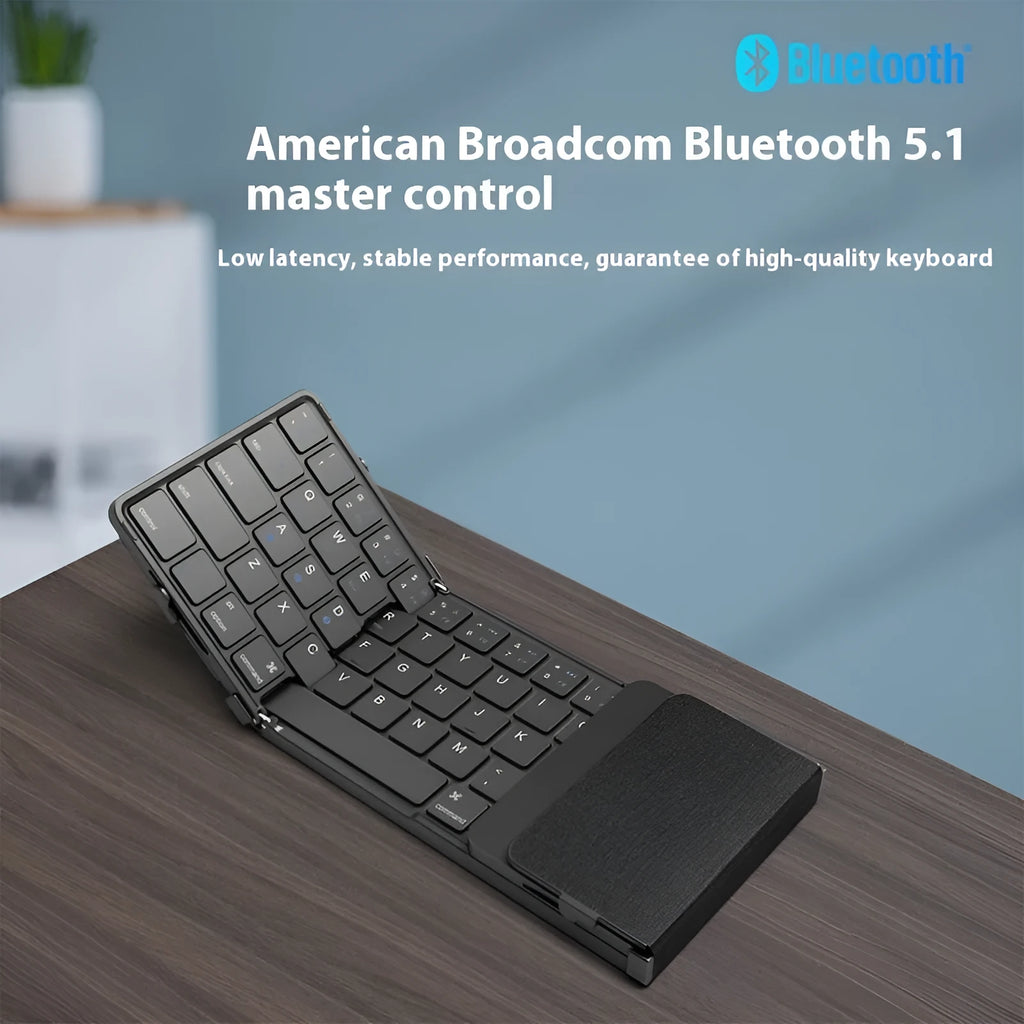 Black folding Bluetooth keyboard with touchpad option showing compact folded size