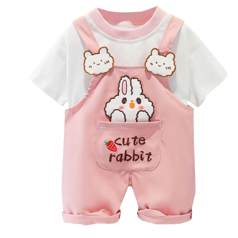 Baby wearing yellow cartoon short-sleeved overalls with adjustable straps