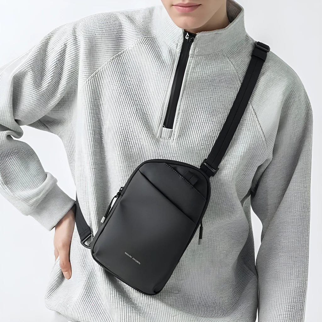 Men's elegant black lightweight crossbody bag made from oxford cloth.