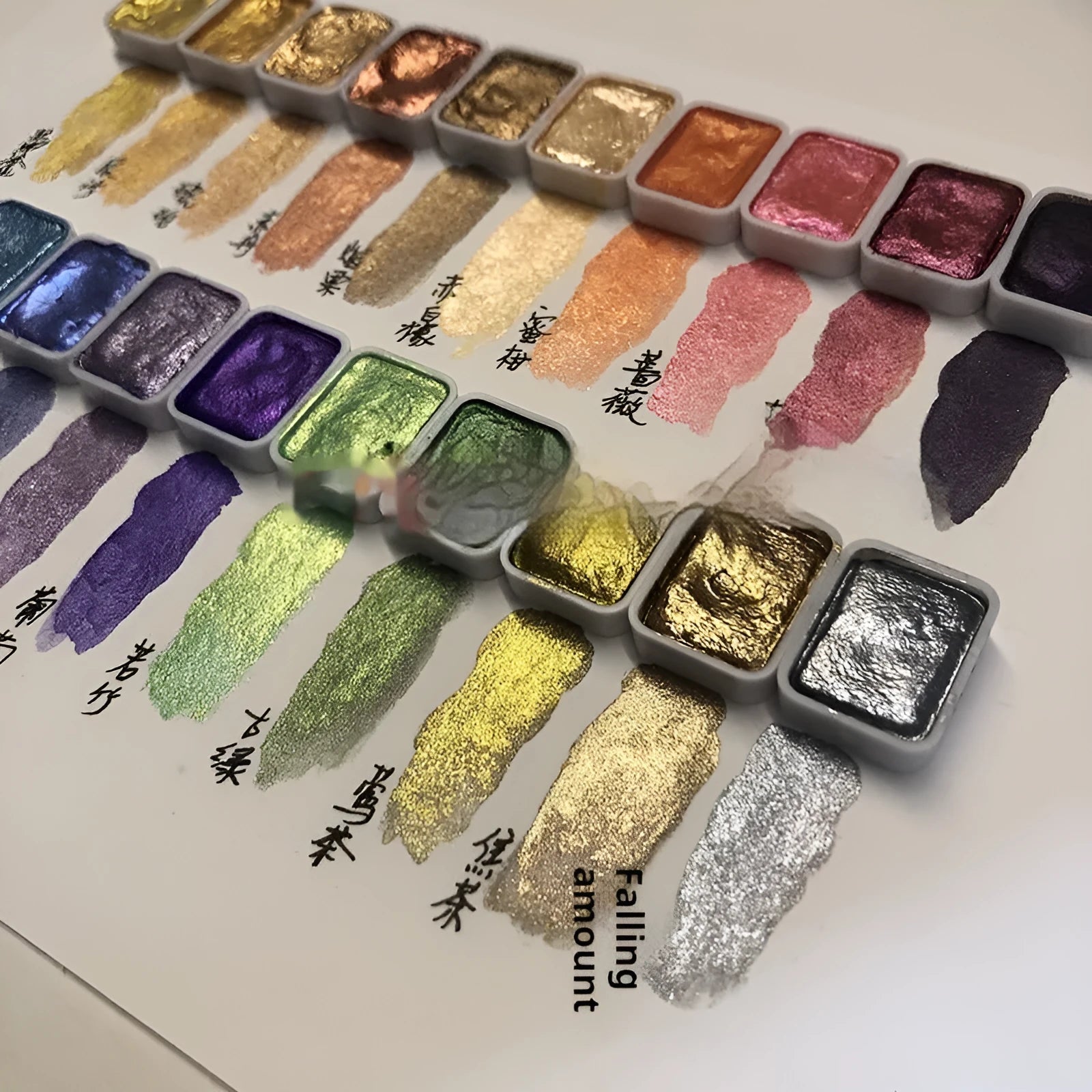Traditional Chinese painting mineral pearlescent watercolour set showing tubes of red, white, gold, and warm and cool colour palettes.