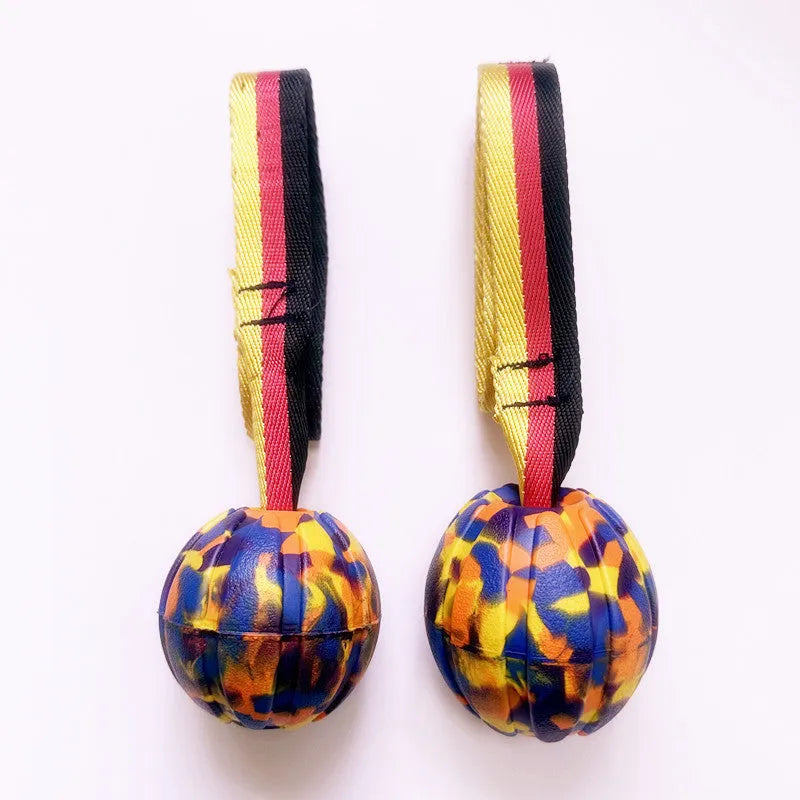 Floating camouflage and yellow EVA string ball dog toy shown in 6.5cm, 7cm and 9cm diameter sizes