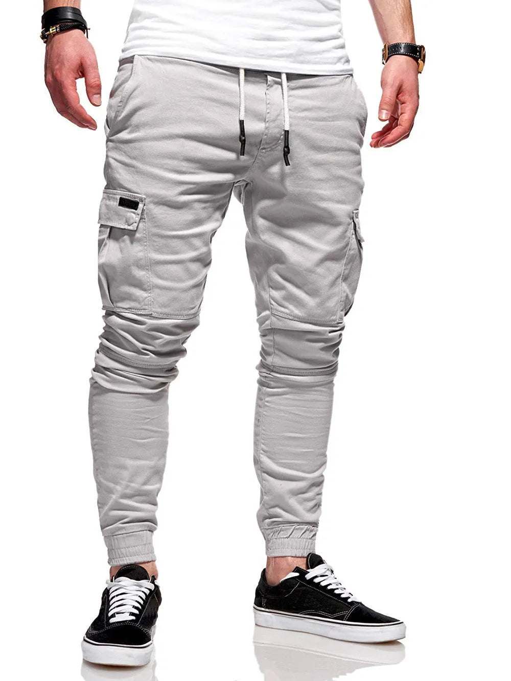 Men's light blue polyester baggy trousers with dimensional patch pockets and straight leg casual styling