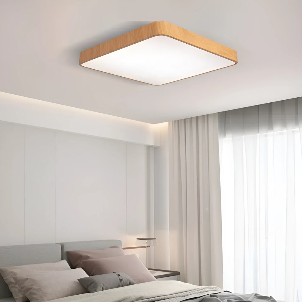 Square Nordic style LED ceiling light with wood grain finish, shown in a bedroom setting.