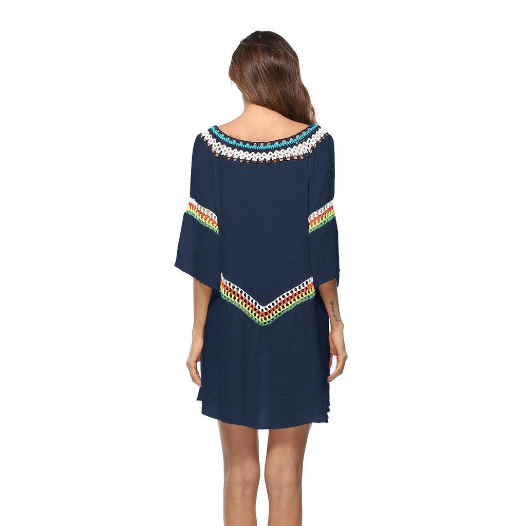 Women's crocheted ethnic style sun protection clothing in apricot colour with beach background