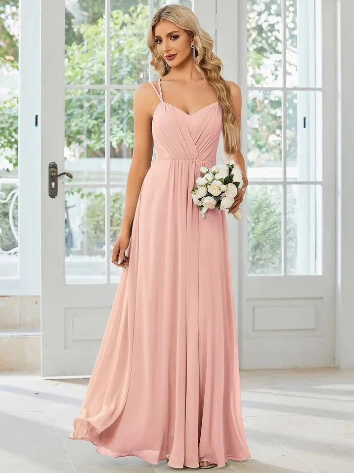 Women's long sleeveless A-line dress with pleated skirt in solid colour options
