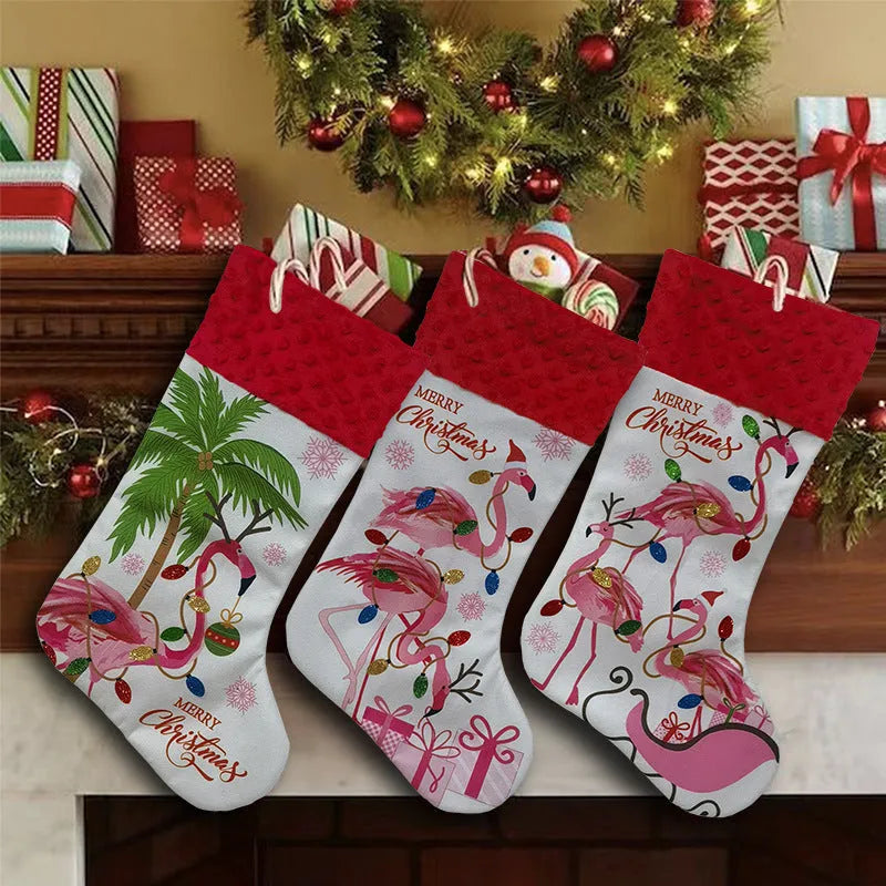 Red cloth flamingo Christmas stocking decoration with white trim, shown hanging.