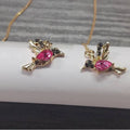 Long drop bird charm earrings in alloy with zircon detailing, available in blue, red, and red lvzuan.