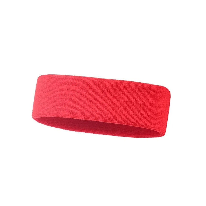 Elastic solid colour sports anti-sweat headband in blue on a white background.