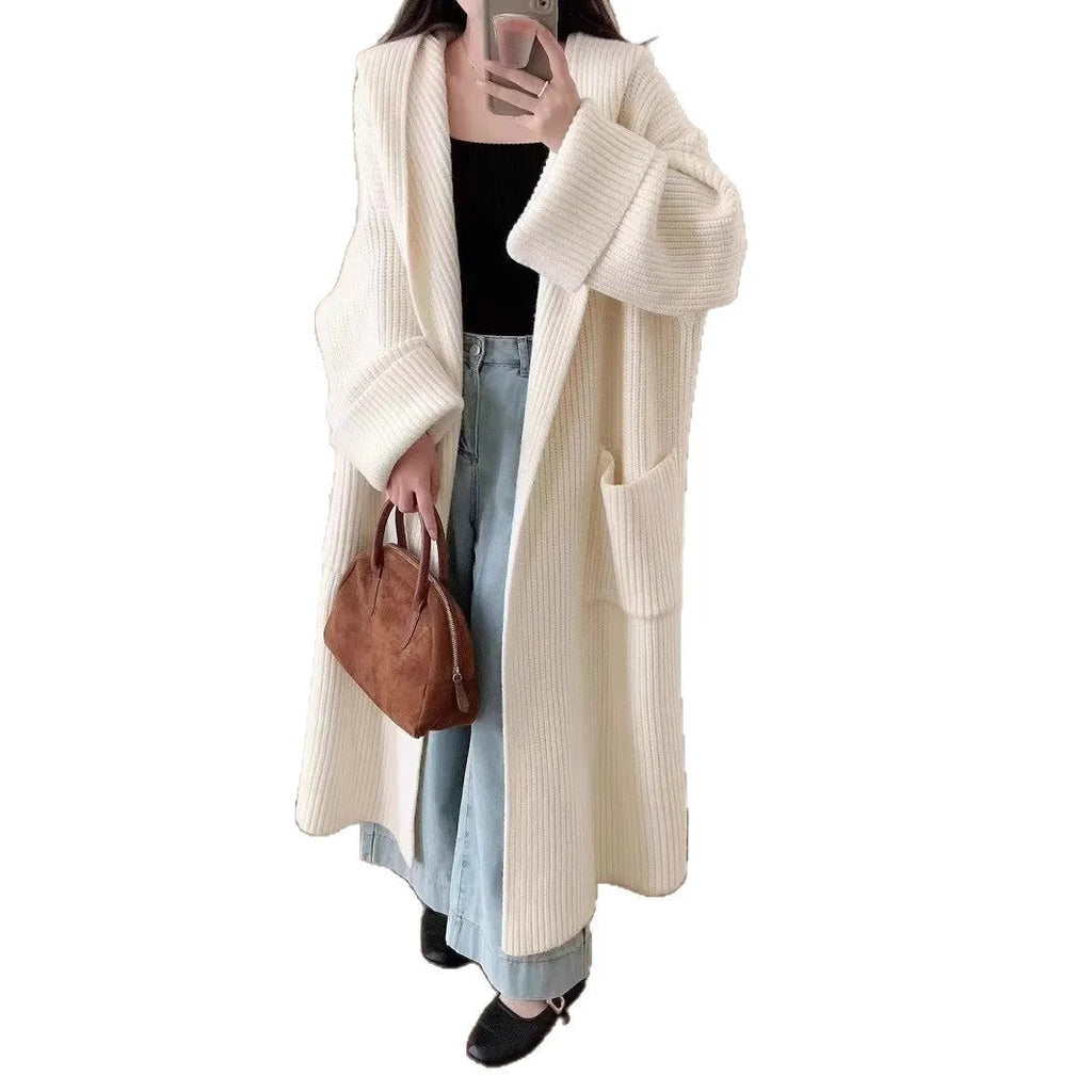 Women's loose hooded cardigan coat in acrylic fabric with raglan sleeves.