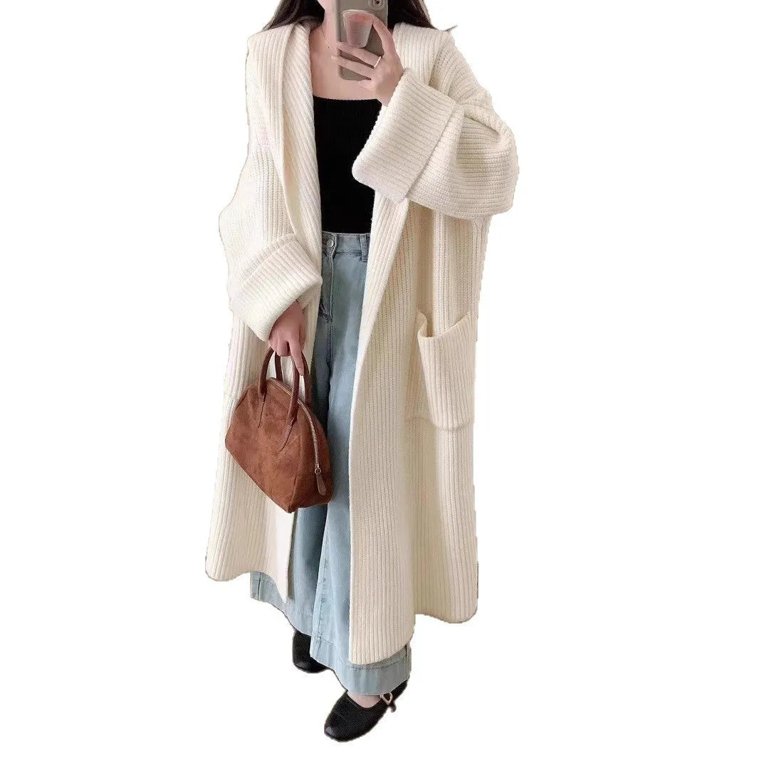 Women's loose hooded cardigan coat in acrylic fabric with raglan sleeves.