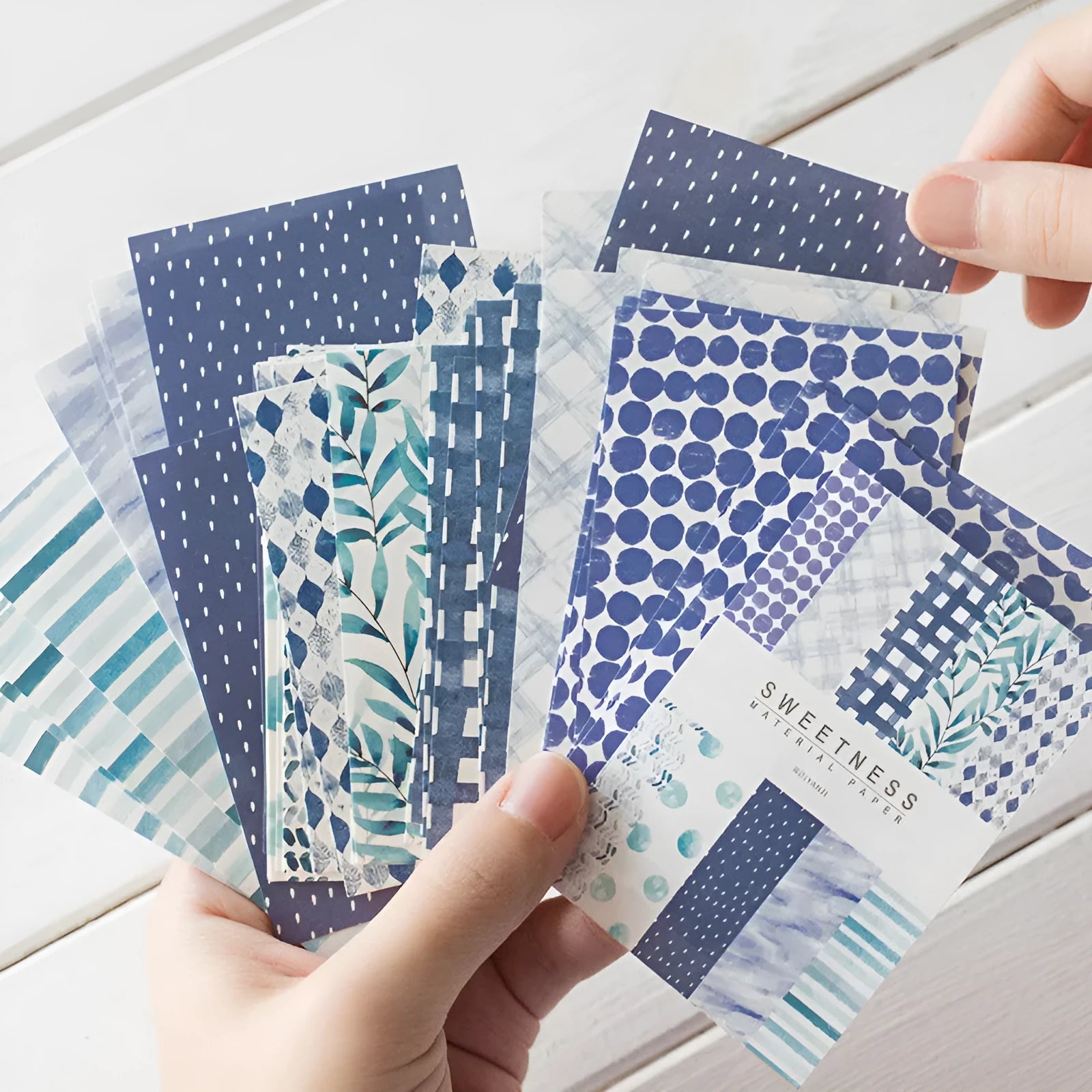 Pack of 50 retro dessert-themed collage note papers in ten colours including caramel puff and blueberry wood sauce.